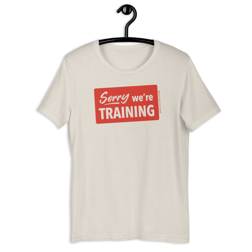 Sorry we're training | Light Unisex T-Shirt