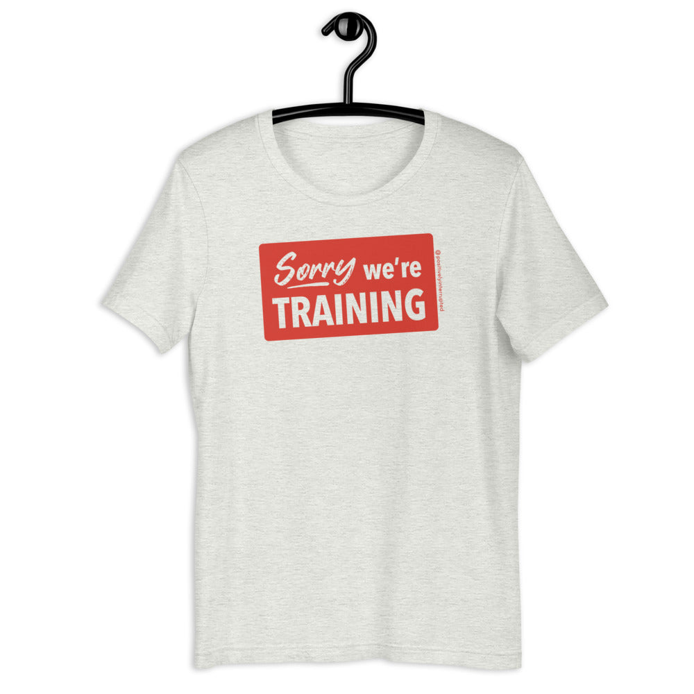 Sorry we're training | Light Unisex T-Shirt